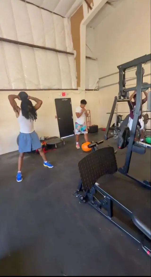 Small group of athletes warming up between sets